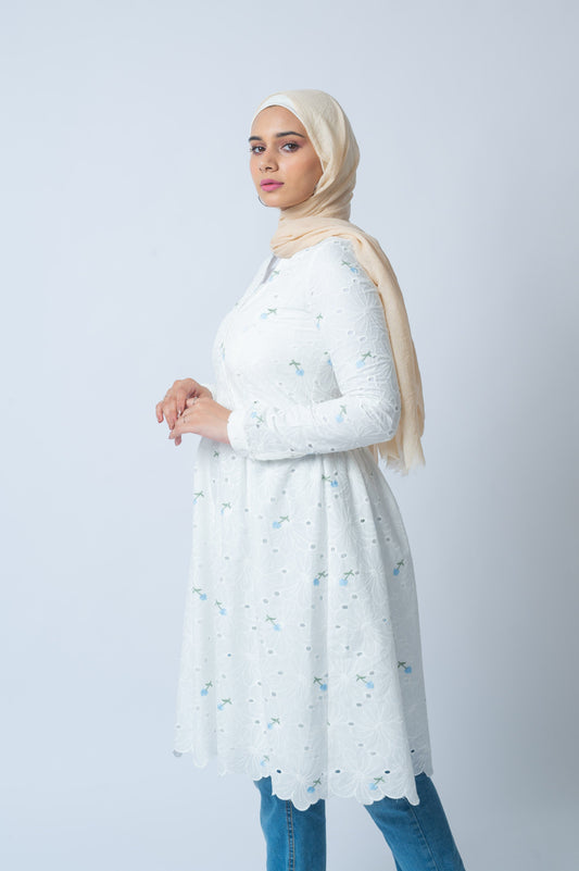 White dress with blue flowers